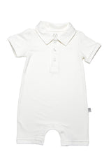 Solid White 3 button polo shirt cut short leg onesie with smart short sleeves with a roll up detail. Sharp structured collar and total ease in our organic cotton super soft one piece baby onesie for toddlers. Our lovingly organics logo is embroidered in tonal color for a descrete logo on right side upper chest area.