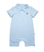 Solid baby blue 3 button polo shirt cut short leg onesie with smart short sleeves with a roll up detail. Sharp structured collar and total ease in our organic cotton super soft one piece baby onesie for toddlers. Our lovingly organics logo is embroidered in tonal color for a descrete logo on right side upper chest area here in navy blue for a little pop