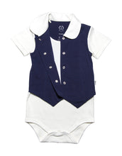 White base baby onesie with sweet peter pan collar and a functinal snap front vest in Navy blue, on short sleeves with a roll up detail. In soft organic cotton , perfect toddler top for your favorite bottoms. Photo also shows the snap vest open with inner white cotton tee with large head opening for easy dressing