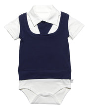 White short sleeve onesie with snap buttons between the legs, short sleeves and a smart collar.  night blue mock sweater vest on top wth a snap tie at the neck shows a complete outfit that is waiting for your favorite bottoms. Soft organic cotton and a polished finished look. 