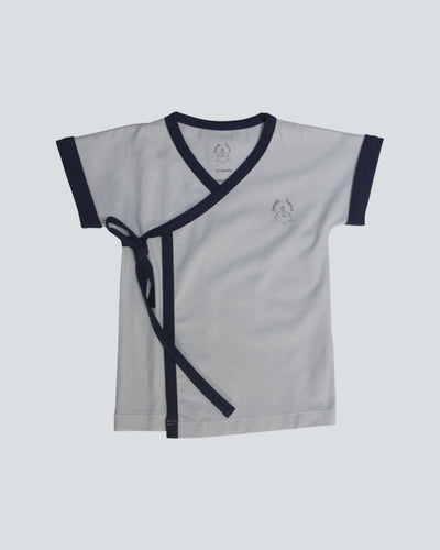 Soft Grey Kimono Wrap Top  with dark navy blue trimmed short sleeved kimono wrap t-shirt or top, with lovingly organic logo in small classic heat transfer style on upper front right chest.  Inside buttons put in to keep your baby wrapped snug with out flaps opening up.  Has a cute tie top left detail with a snap closure to ensure top stays secure.